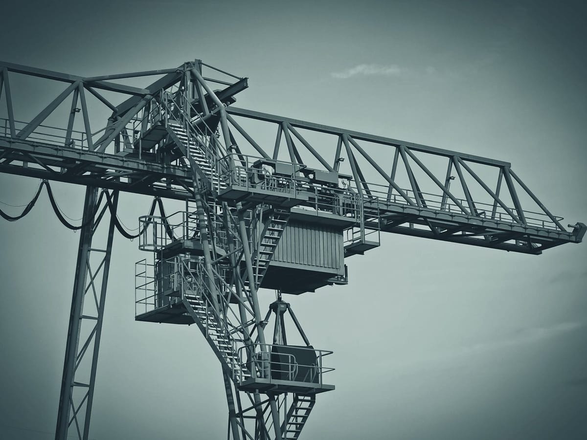 A tower crane against an open sky