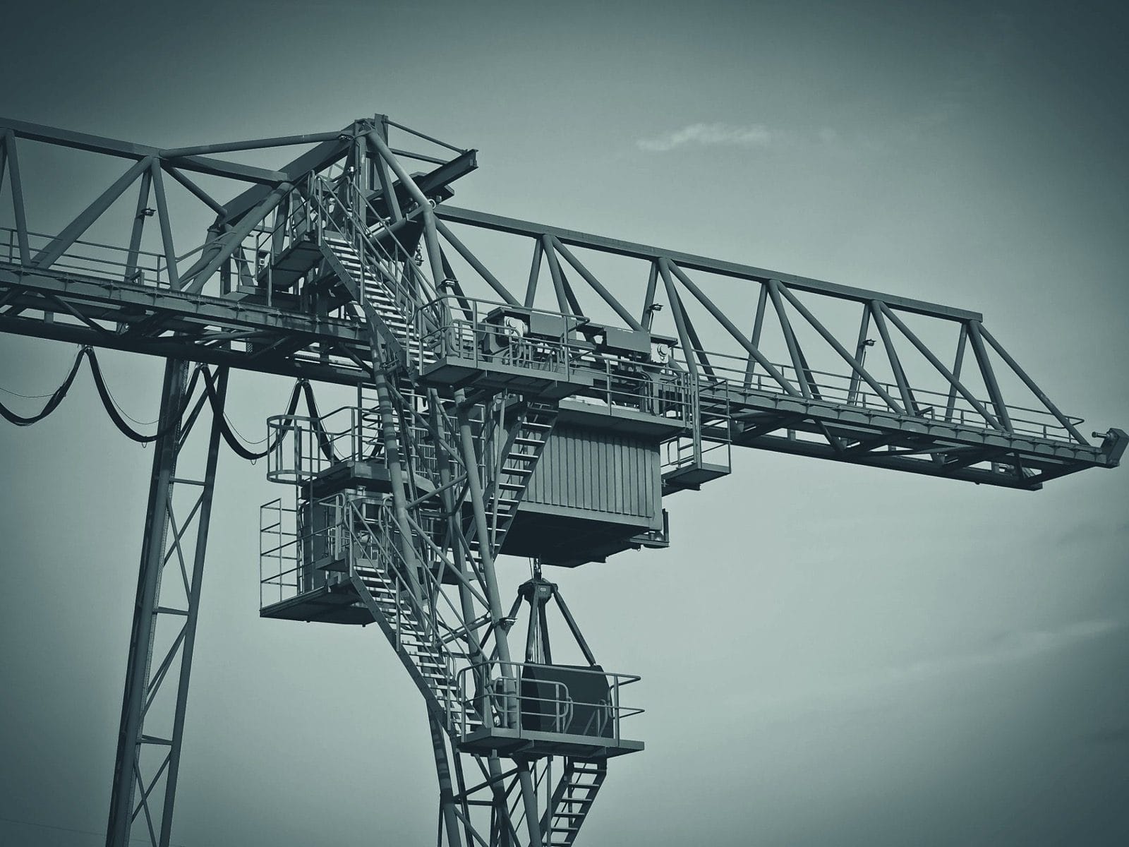 A tower crane against an open sky