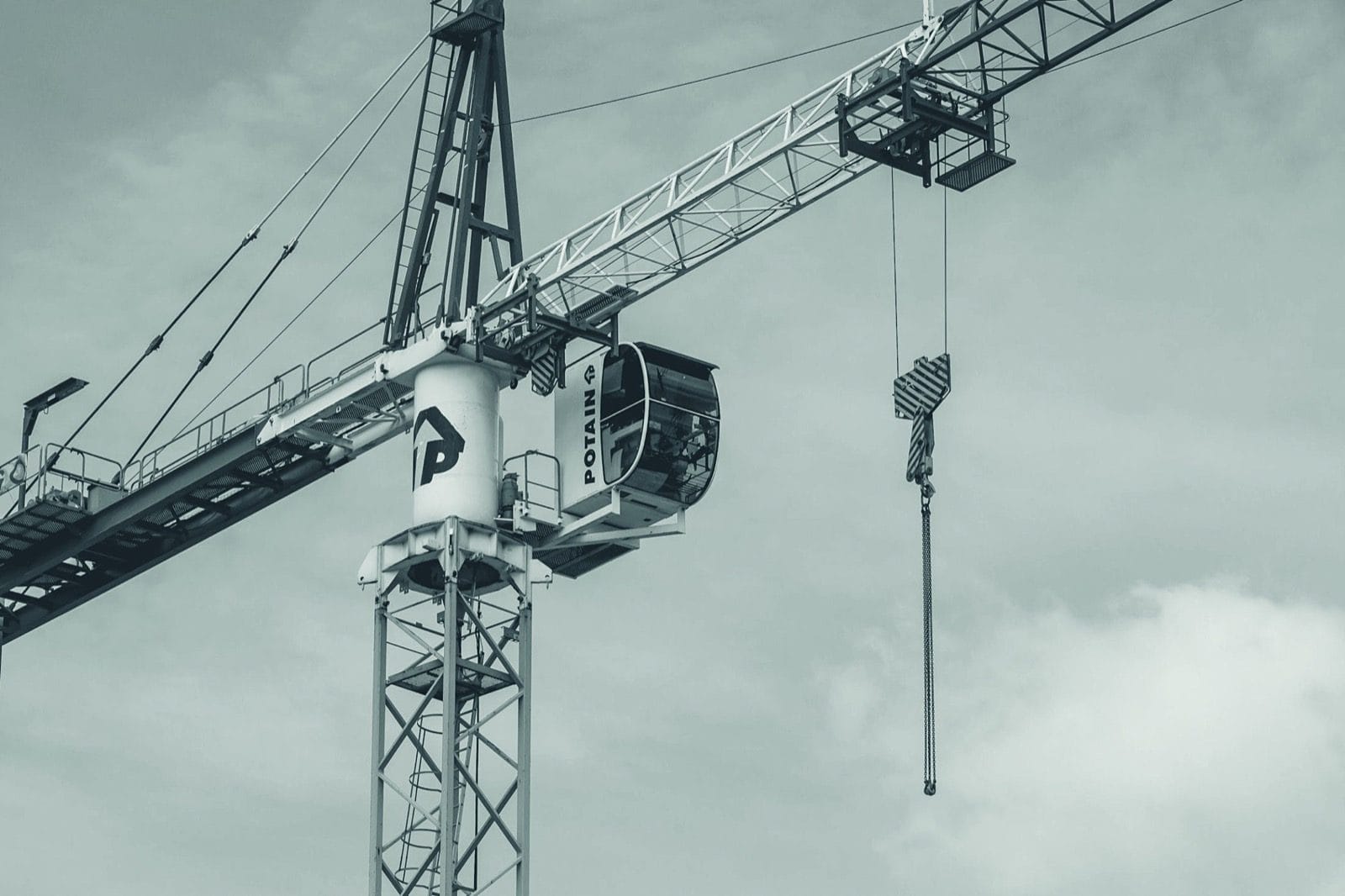 A construction tower crane against the sky