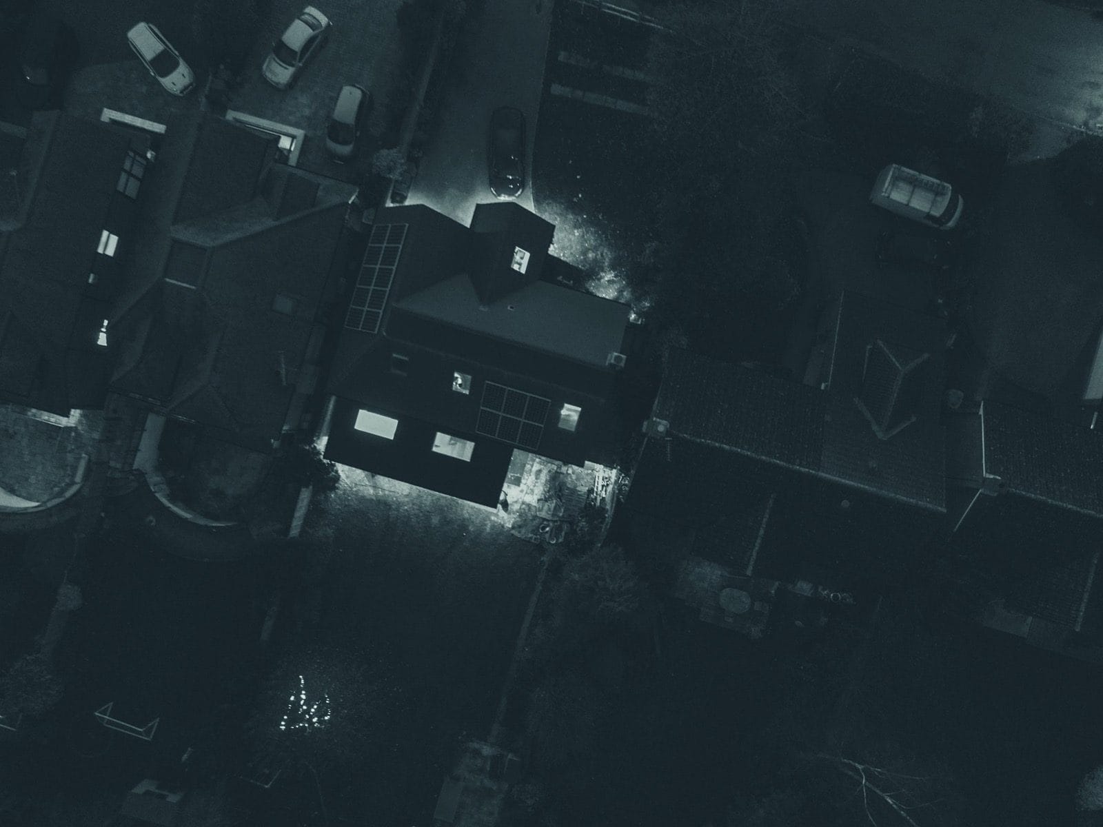 Aerial view of UK houses from above in the evening