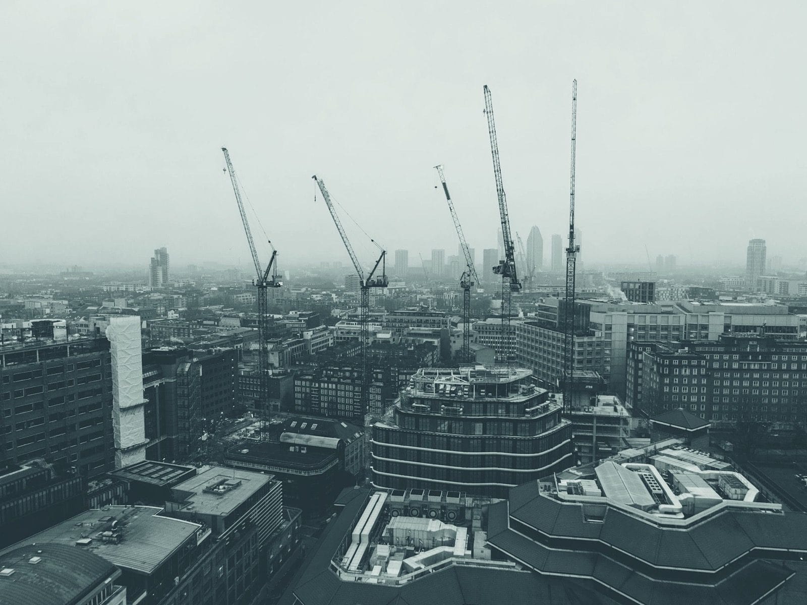 Aerial view of a London construction site with cranes