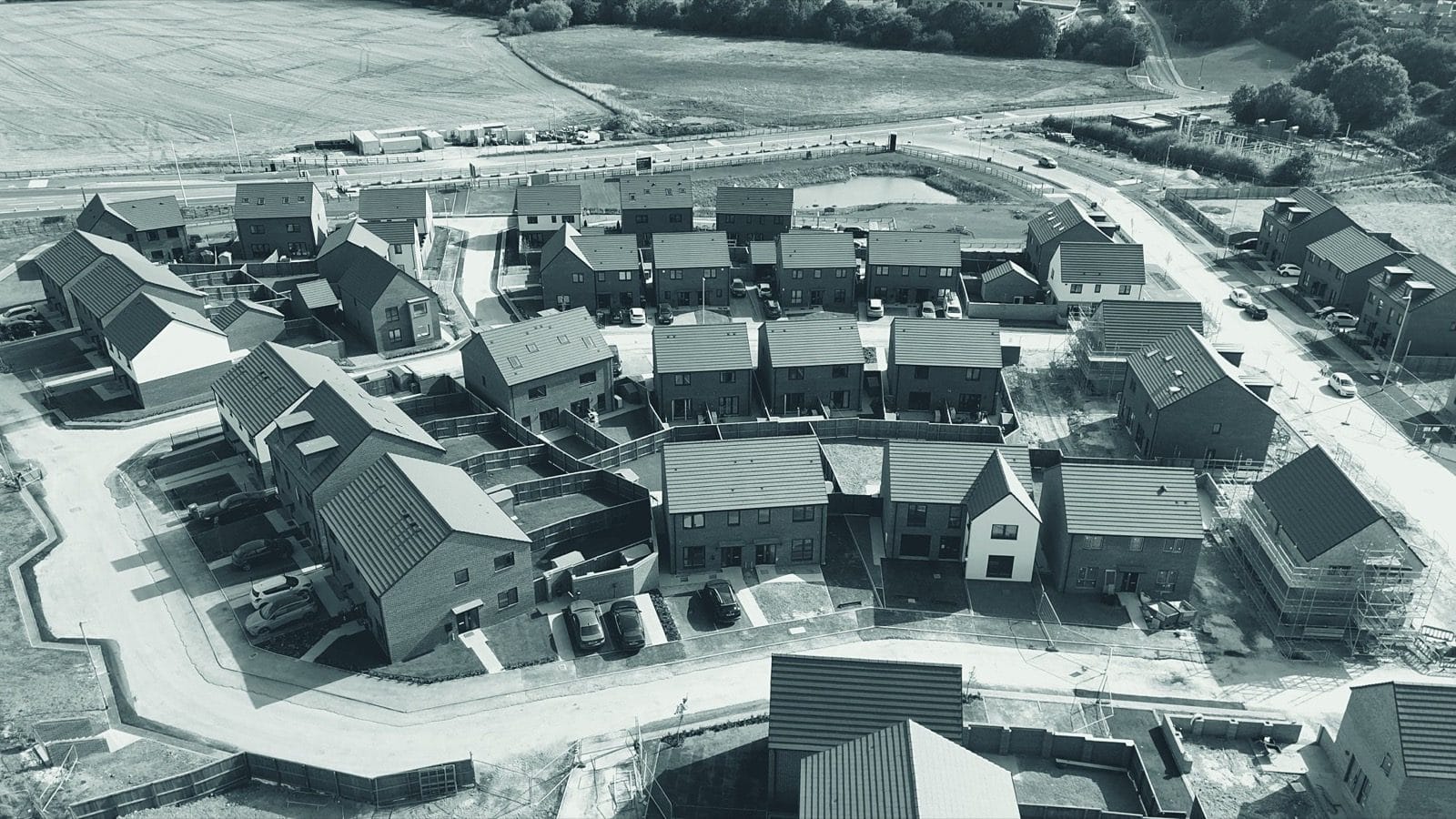 Drone view of new-build housing rooftops