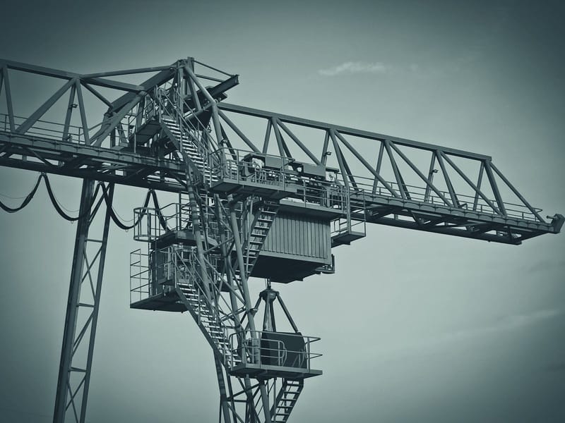 A tower crane against an open sky